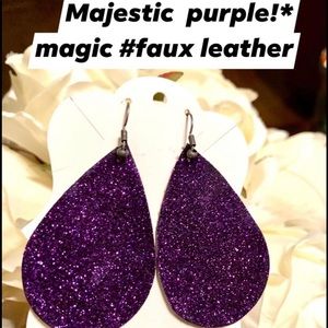 Purple sparkled faux leather 2” teardrop earrings.